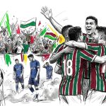 Soccer players in green-and-red striped jerseys hug and cheer after a goal as the crowd waves flags in the background.