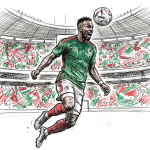 Soccer player in a green jersey celebrates a goal in a stadium, with a ball in the air and a cheering red-and-green crowd in the background.